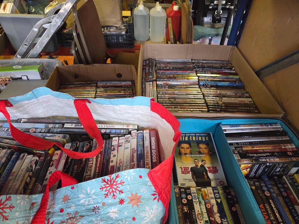 Lot 402 – A Large Collection of Pre-owned DVDs and Home Media including Various Film Genres