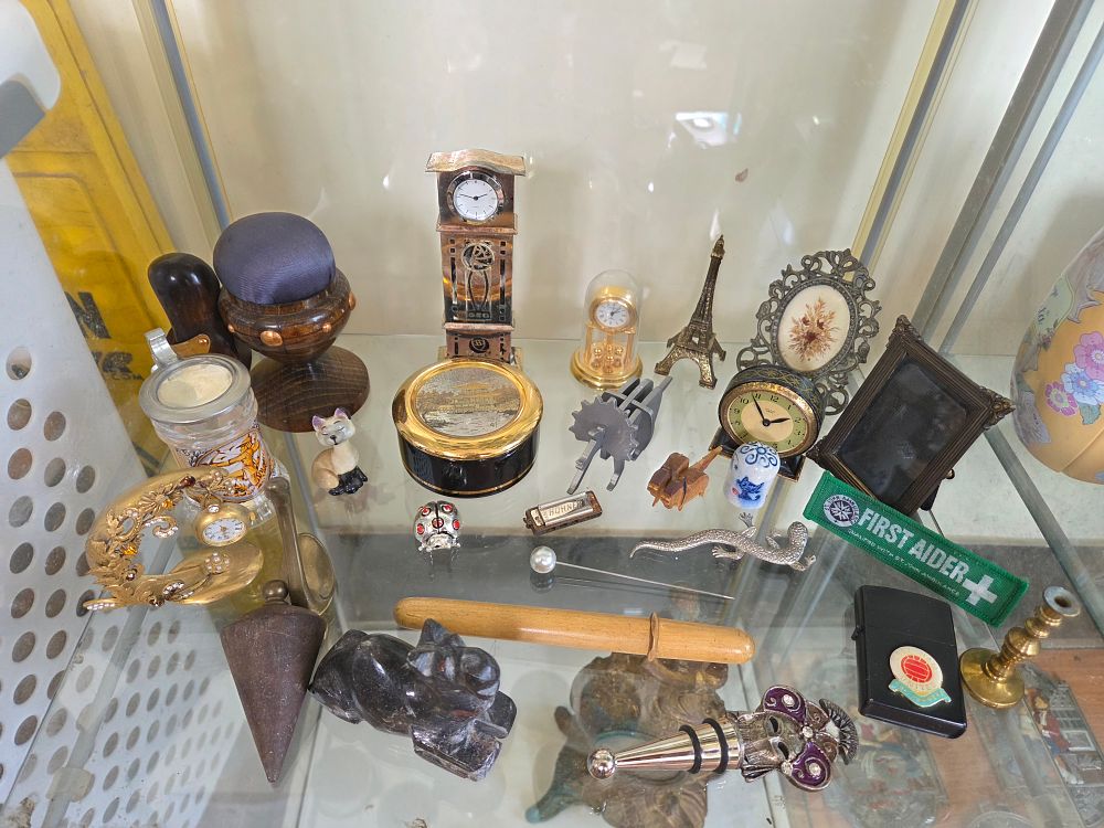 Lot 625 – An Assortment of Vintage and Antique Curios, Miniature Timepieces, and Collectibles