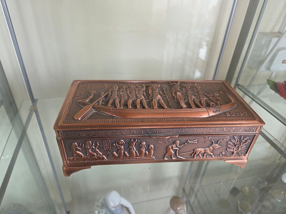 Lot 641 – An Egyptian Revival Copper-Plated Cast Metal Jewellery Box