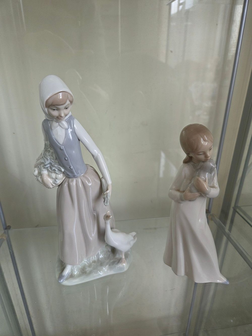 Lot 642 – Two Porcelain Figurines by Nao