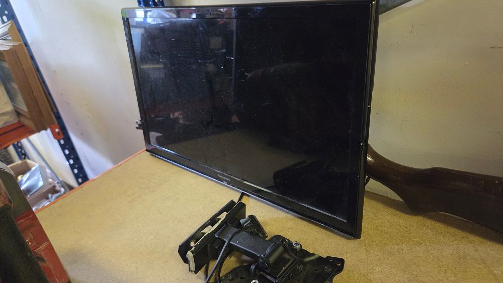 Lot 151 – Panasonic television with articulating wall mount bracket