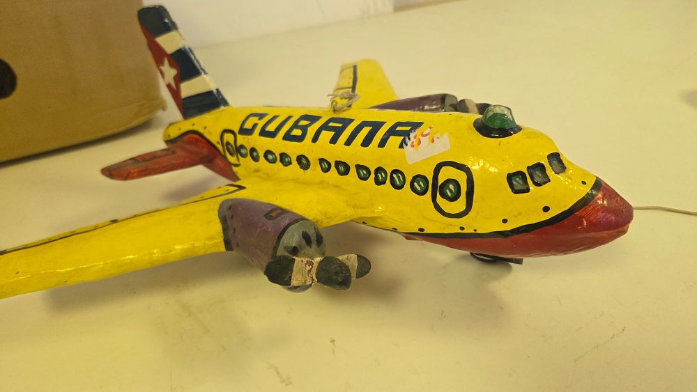 Lot 168 – Folk Art Model Airplane Depicting Cubana de Aviación