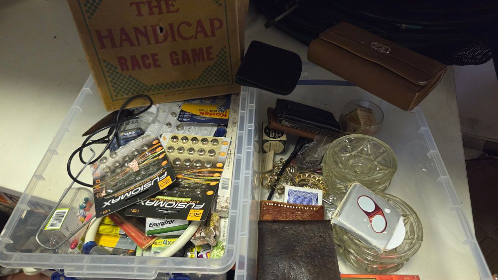 Lot 186 – Two Boxes of Vintage Games, Glassware, Wallets, and Household Sundries