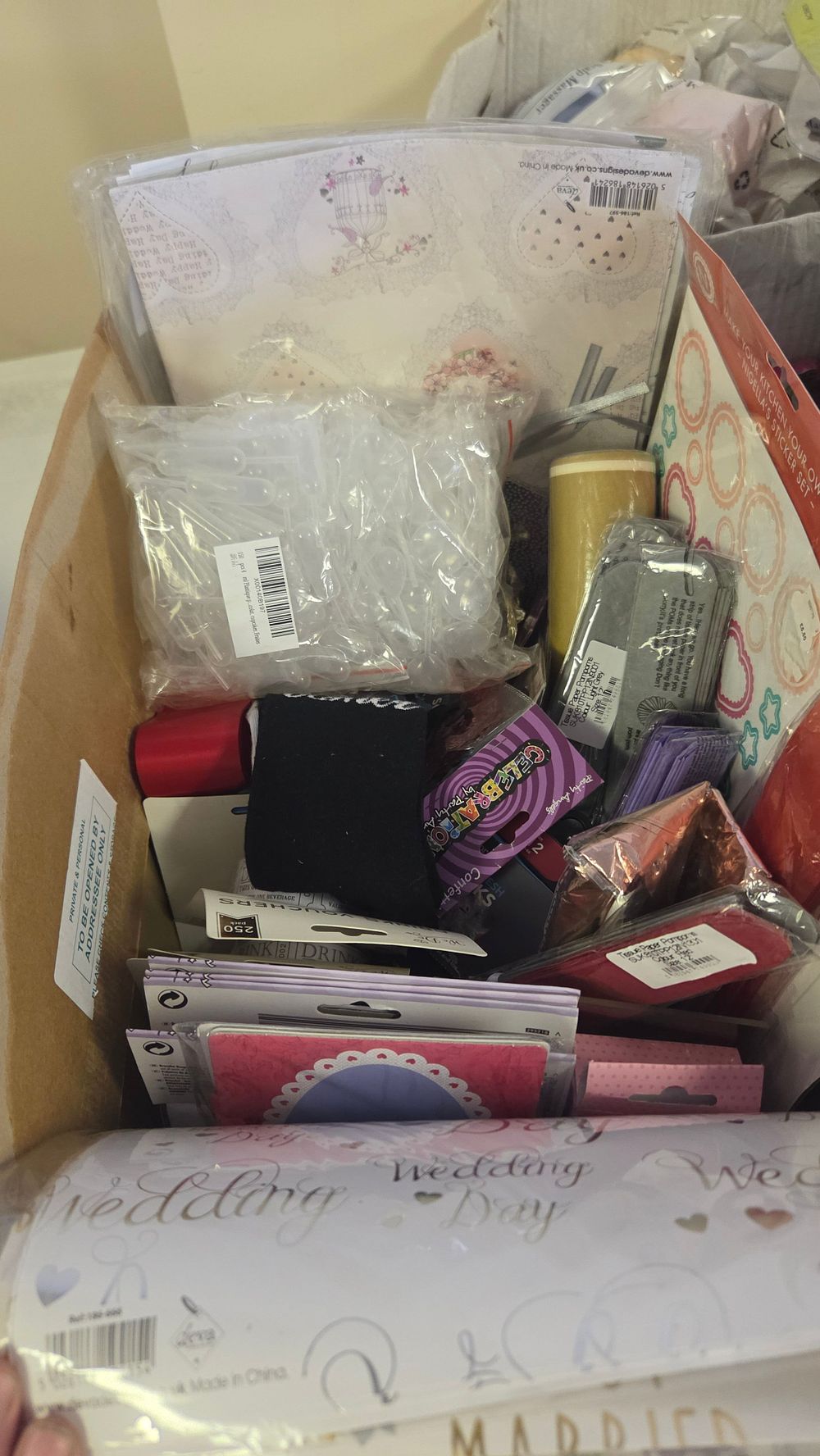 Lot 220 – An Assortment of New Retail-Packaged Wedding and Party Supplies