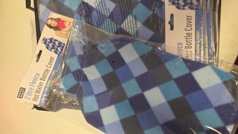 Lot 235 – A Selection of Home Smart 2-litre Fleece Hot Water Bottle Covers in Blue Chequered Pattern