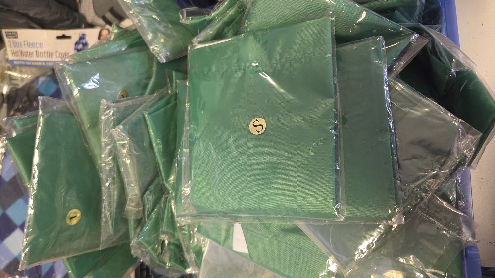 Lot 243 – A Group of Eveque Green Nylon Sports Training Bibs Various Sizes