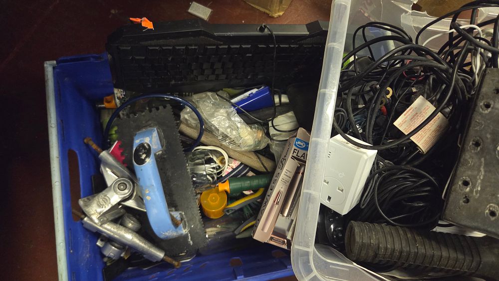Lot 261 – Two Boxes of Household Goods, Power Tools, and Networking Electronics