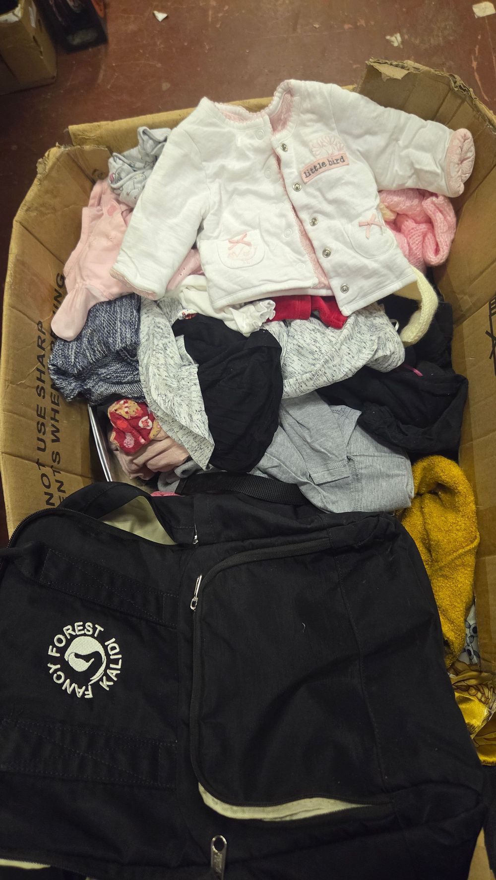Lot 267 – A Collection of Assorted Clothing and a Kalidi Fancy Forest Bag