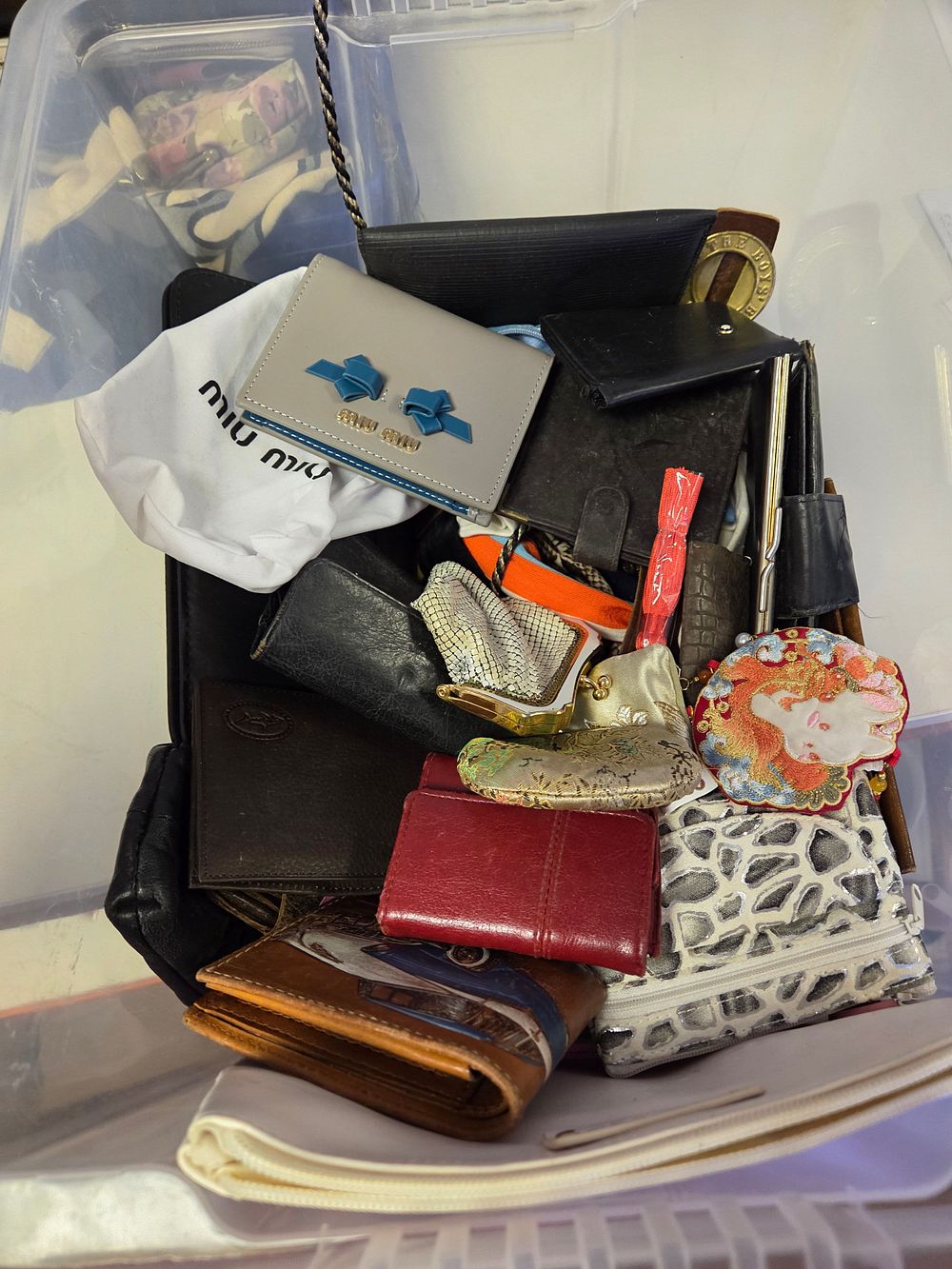 Lot 302 – An Assortment of Purses Wallets and Small Leather Goods to include Miu Miu