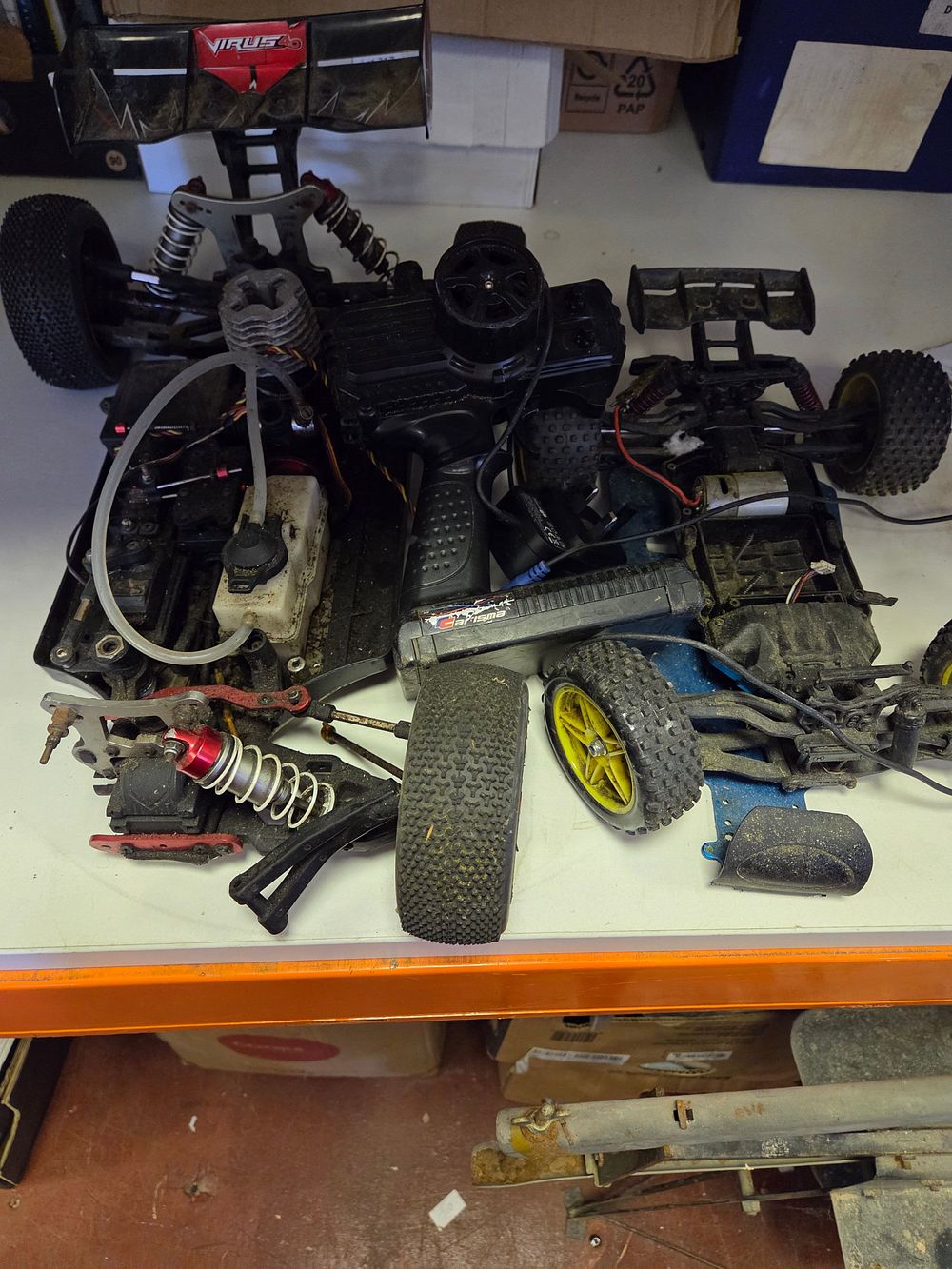 Lot 321 – A Collection of Radio-Controlled Model Buggies and Accessories including Carson and Carisma Components