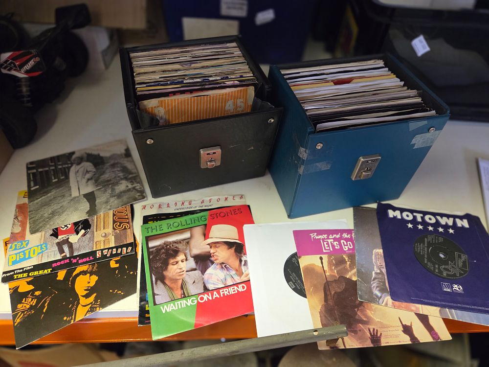 Lot 323 – A Collection of 7-inch Vinyl Singles in Two Vintage Storage Cases inc Bowie, Queen and Madonna
