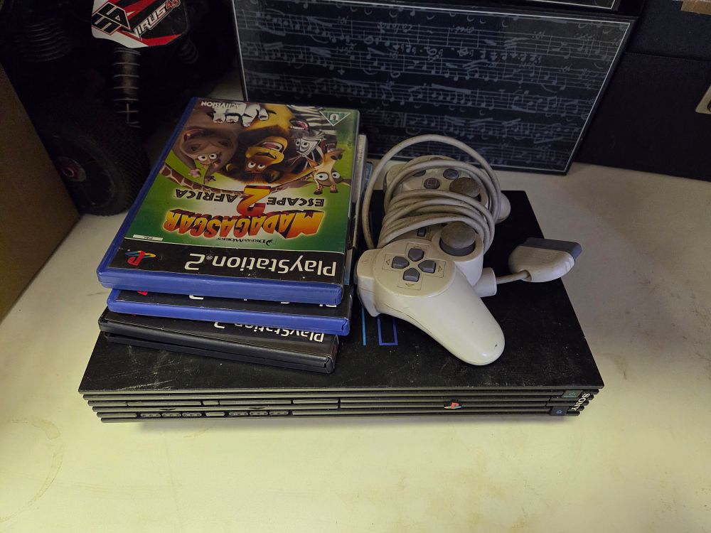 Lot 327 – A Collection of Sony PlayStation 2 Gaming Equipment and Games