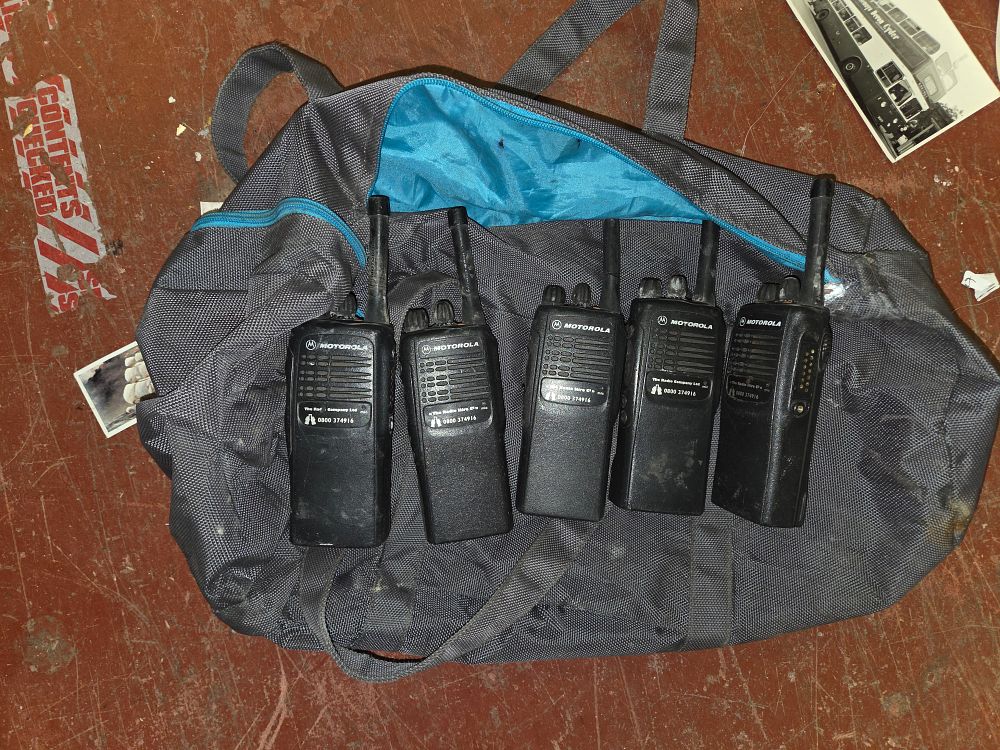 Lot 376 – A Set of Five Motorola Professional Series Handheld Two-Way Radios and Carry Bag