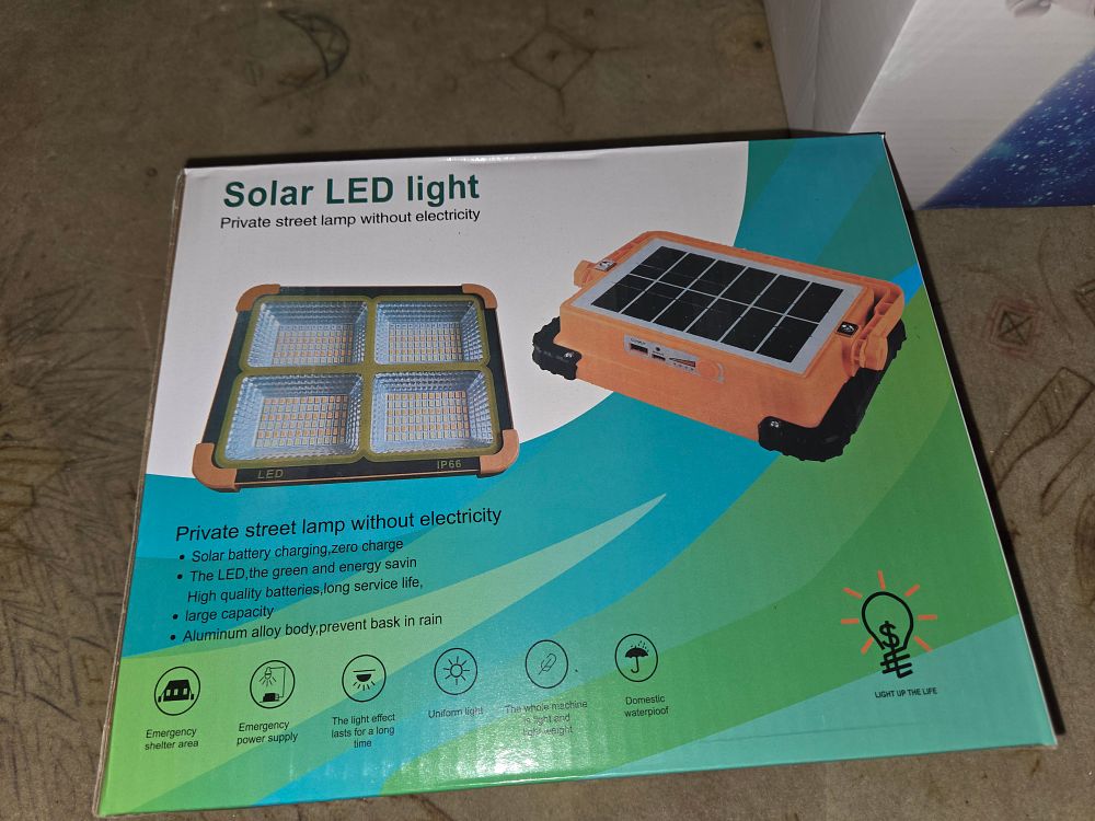 Lot 389 – New Portable Solar LED Work Light with Integrated Solar Panel and IP66 Waterproof Rating