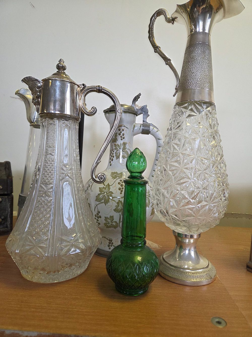Lot 648 – A Collection of Decorative Glass and Ceramic Vessels Including Silver-Plated Mounted Claret Jugs