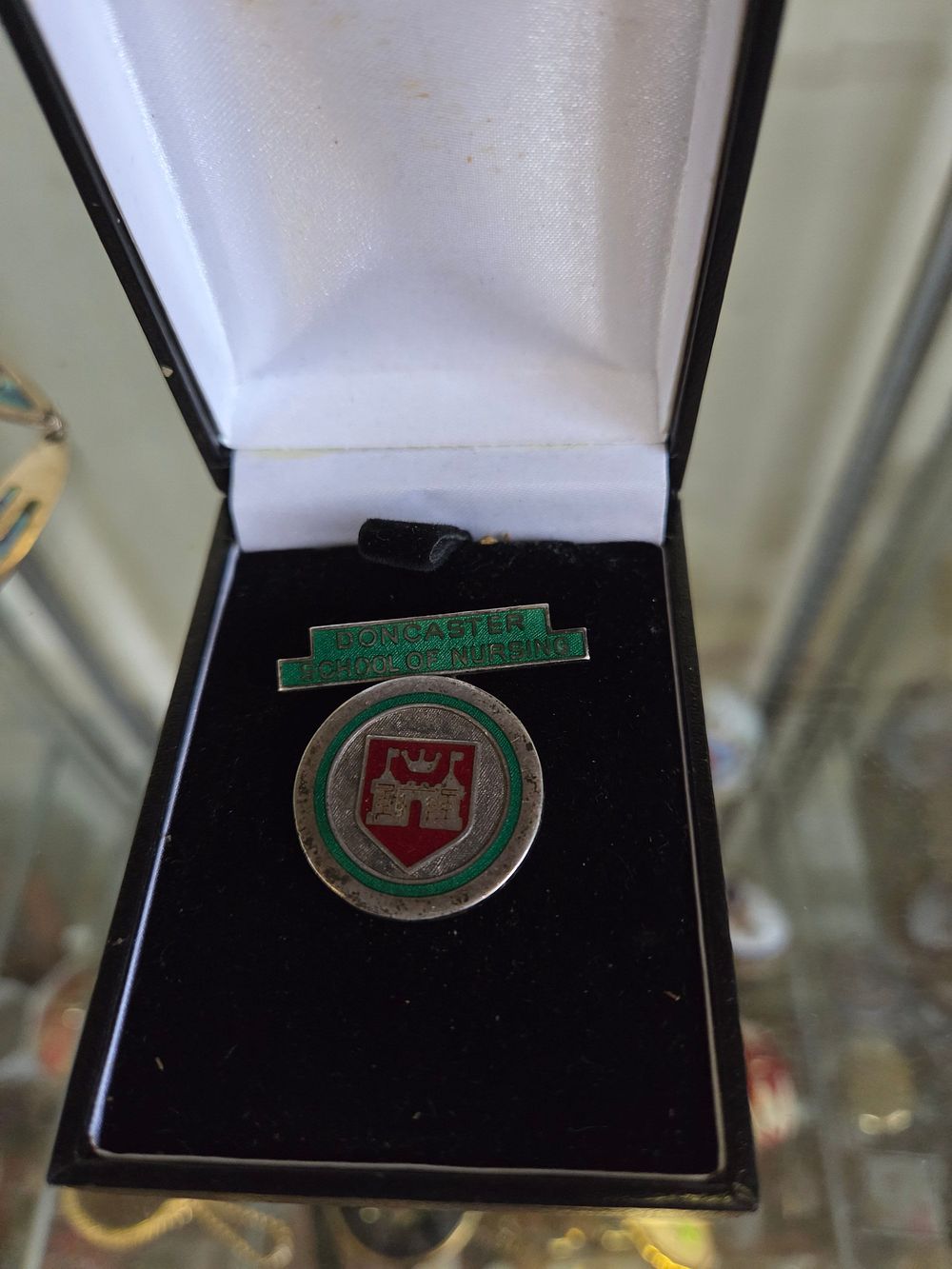 Lot 656 – Silver 925 and Enamel Doncaster School of Nursing SEN (MD) Badge 10.76g