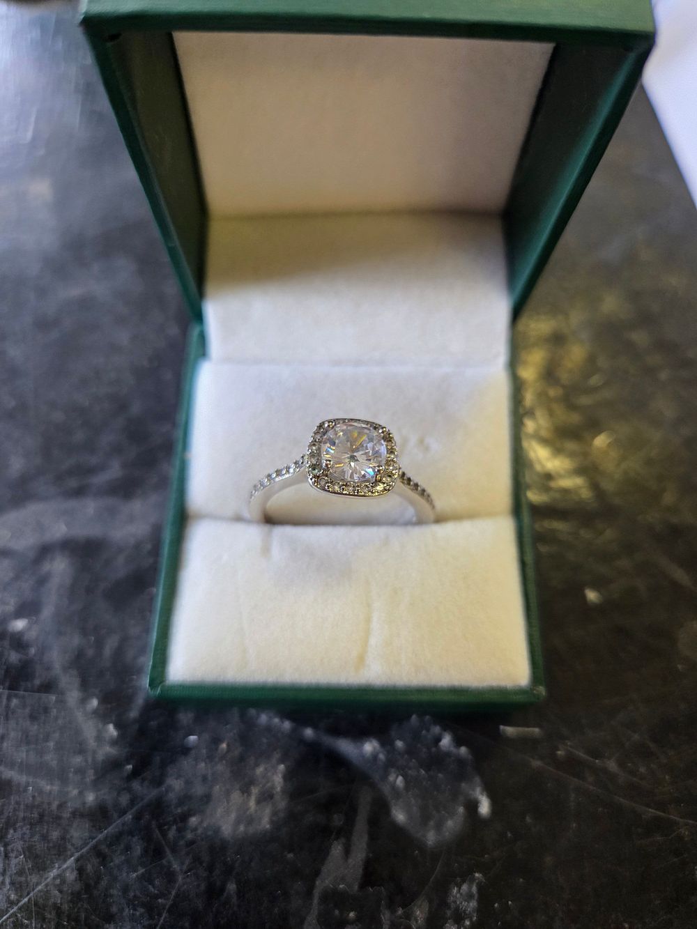 Lot 660 – A Silver 925l halo engagement style ring set with colourless stones