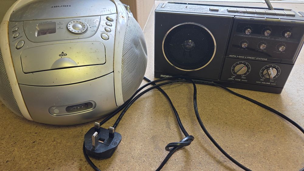 Lot 178 – Two portable audio units comprising a Bush CD radio cassette player and a Roper multi-band radio