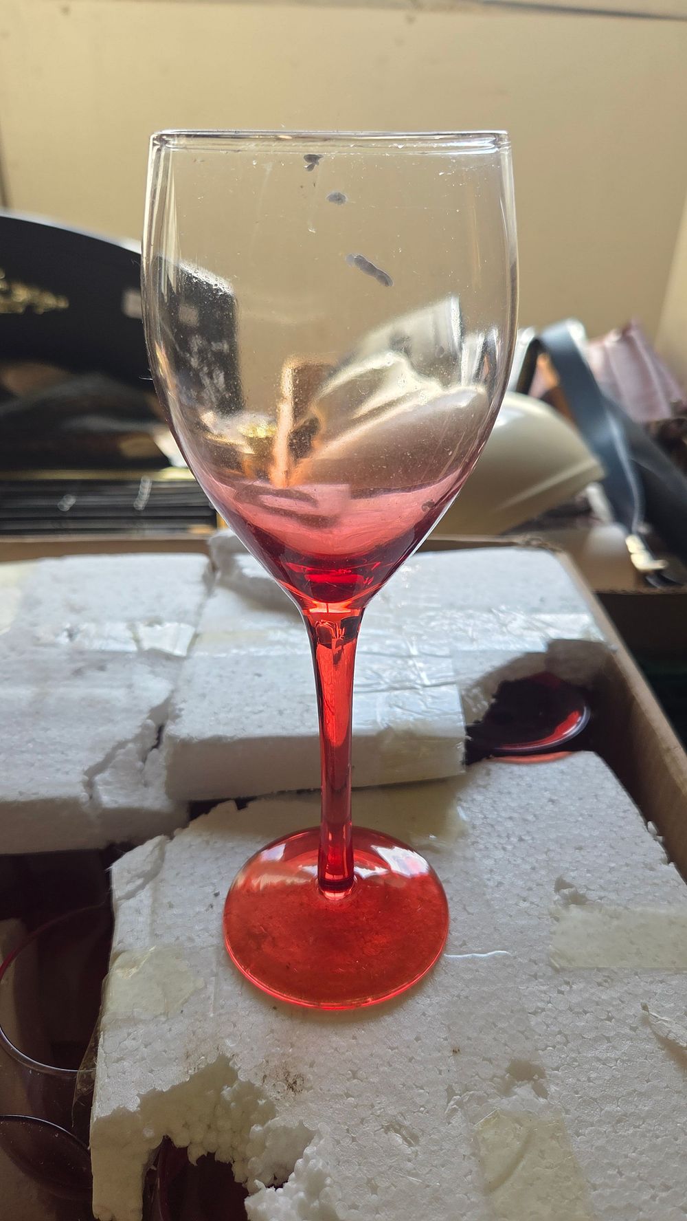 Lot 208 – A Set of 16 Modern Wine Glasses with Graduated Ruby-Red Tints