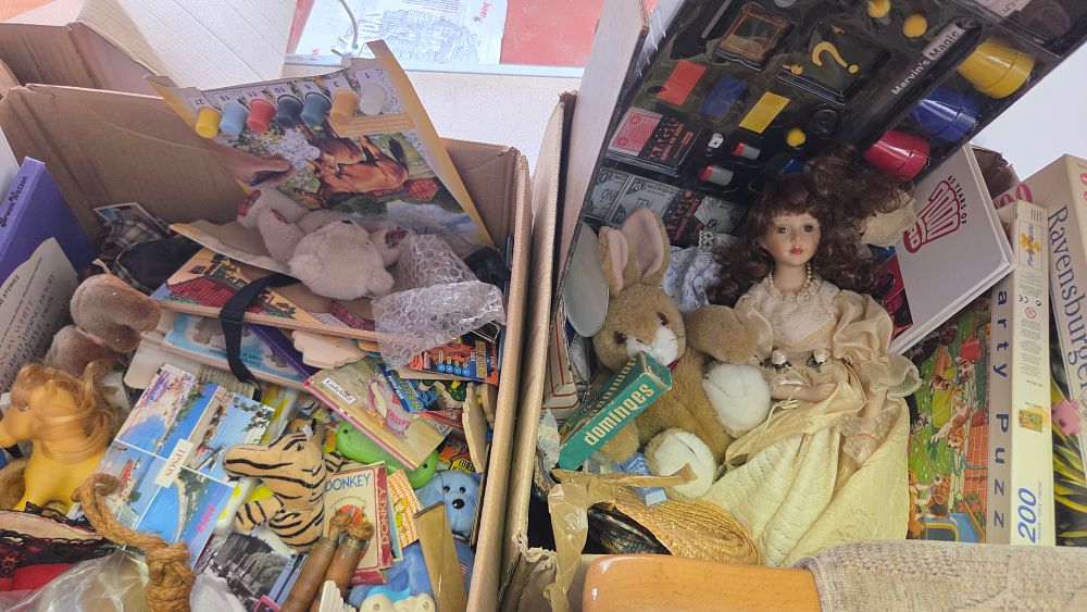 Lot 219 – Two Boxes of Vintage and Contemporary Toys Games and Collectables including a Porcelain Doll