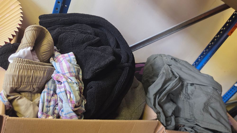 Lot 259 – Two Boxes of Clothing