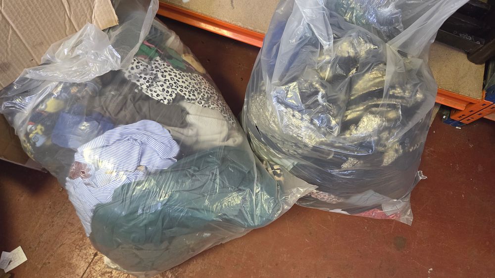 Lot 265 – Two bags of Clothing