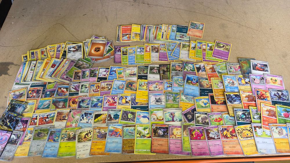 Lot 285 – A Collection of Pokémon TCG Cards Including Enamorus V Full Art and Charizard GX