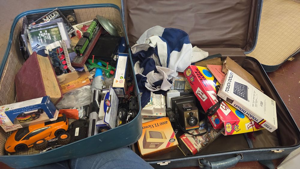 Lot 307 – Two Suitcases of Vintage and Collectable Toys, Games, and Media