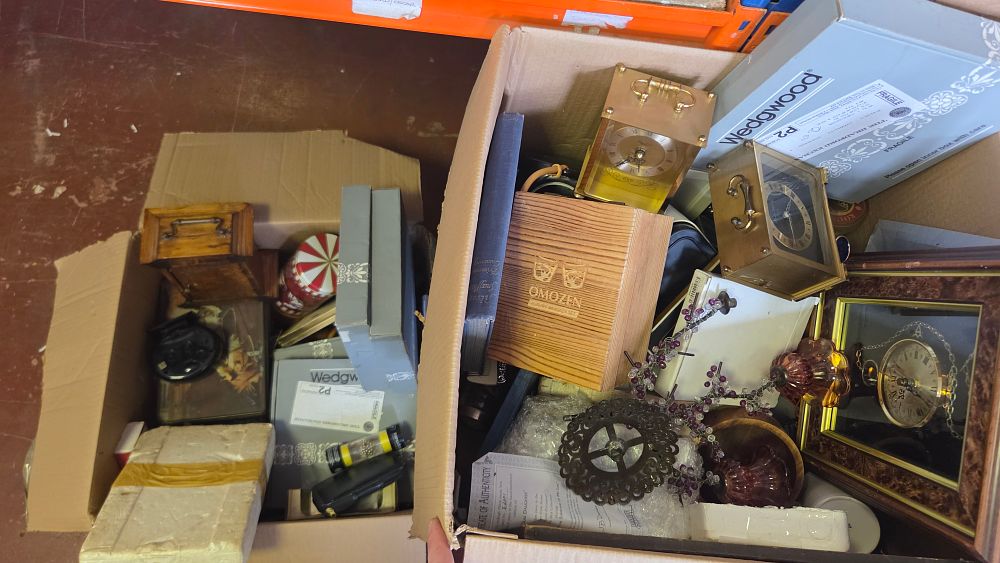 Lot 338 – Two Boxes of Household Items and Collectables including Brass-Cased Clocks and Branded Packaging