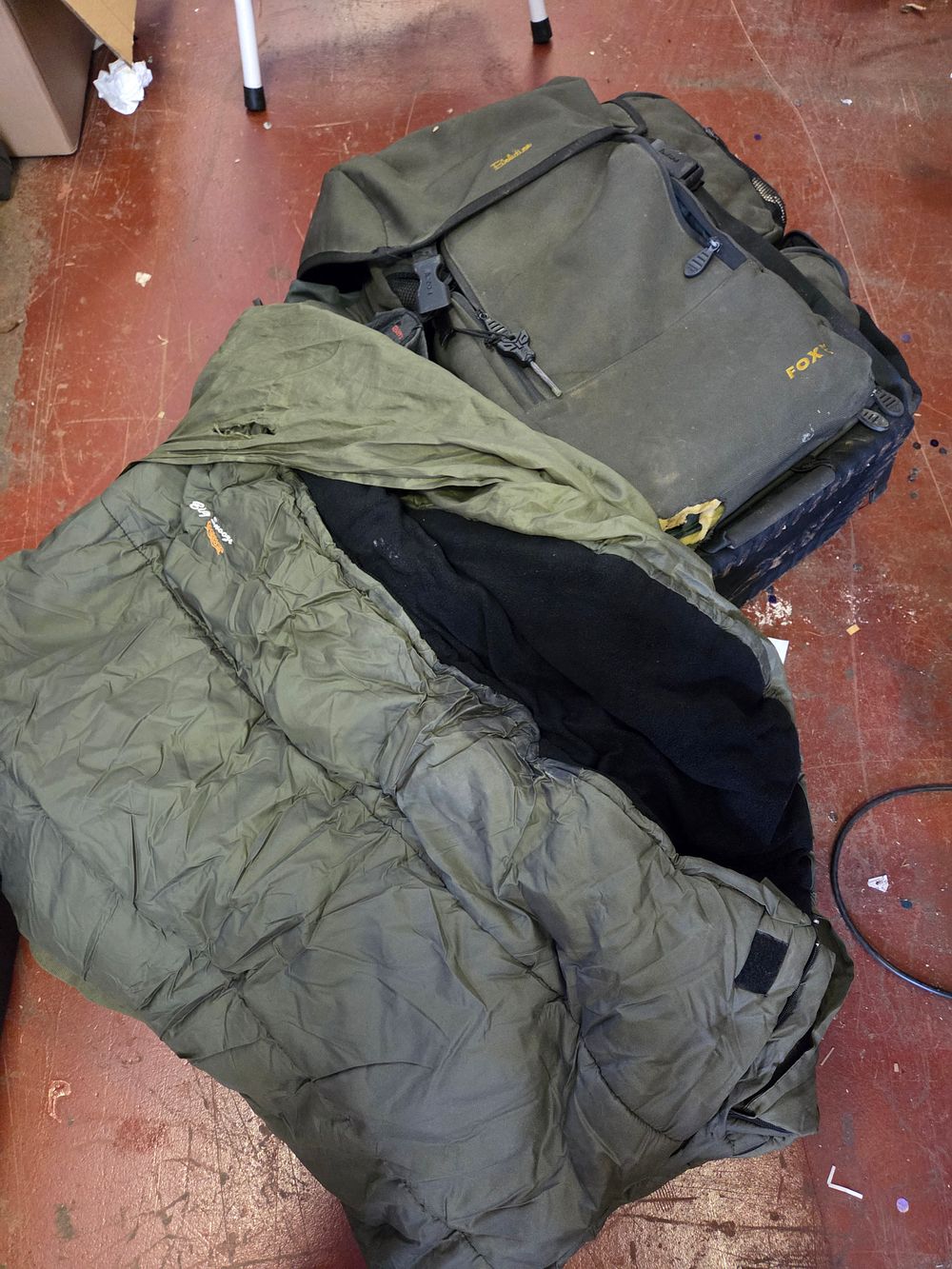 Lot 221 – Two Items of Angling Equipment Comprising a Trakker Big Snooze Sleeping Bag and a Fox Rucksack