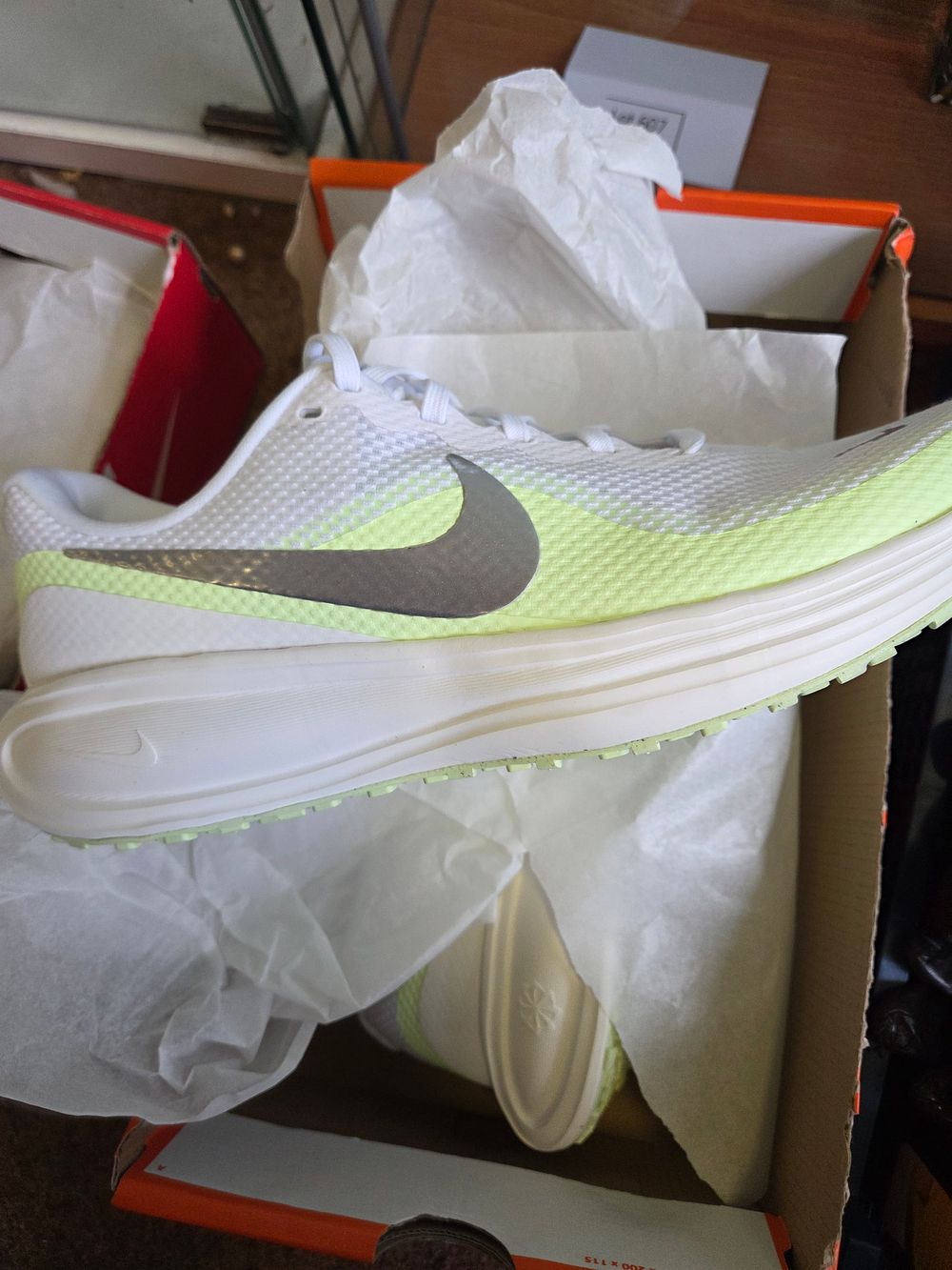 Lot 289 – A Pair of New Nike Revolution 8 Women’s Road Running Trainers in White and Metallic Silver Size 8