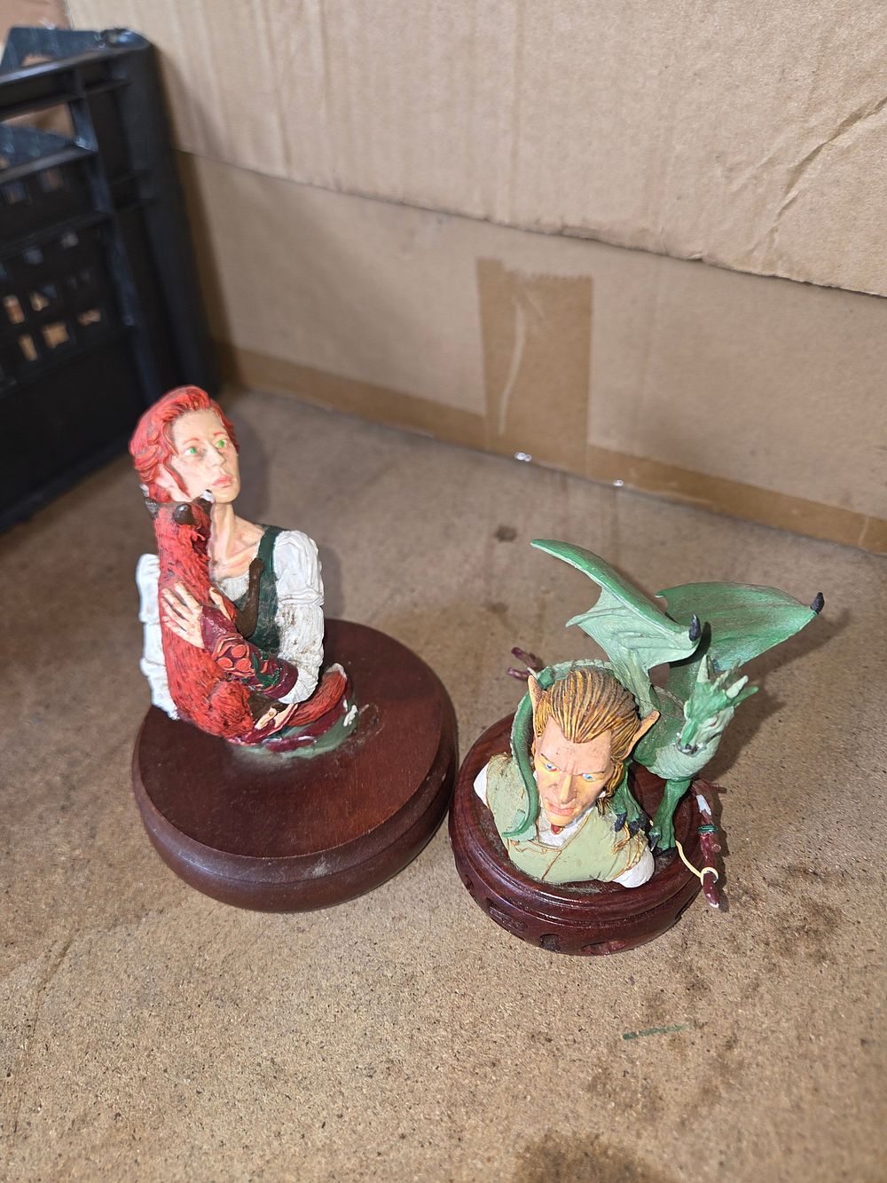 Lot 400 – A Pair of Hand-Painted Fantasy Miniature Busts Depicting Figures with Dragon Companions