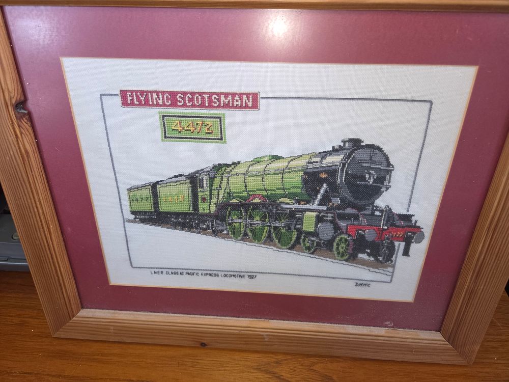 Lot 429 – A Framed Cross-Stitch Needlework of the LNER Flying Scotsman Locomotive No. 4472