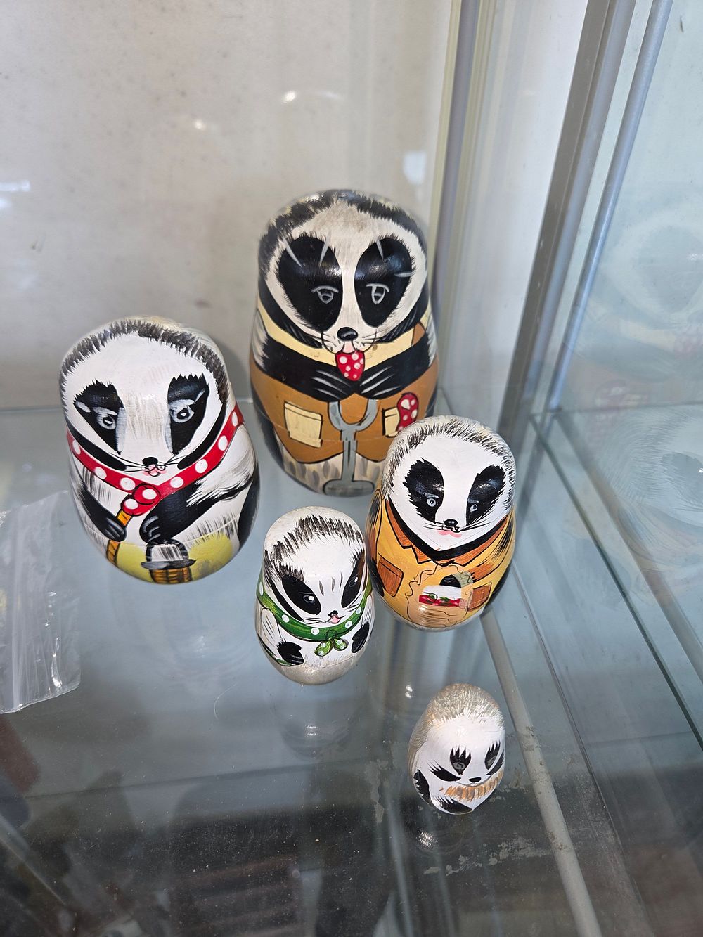 Lot 604 – A Set of Five Animal-Themed Wooden Nesting Dolls
