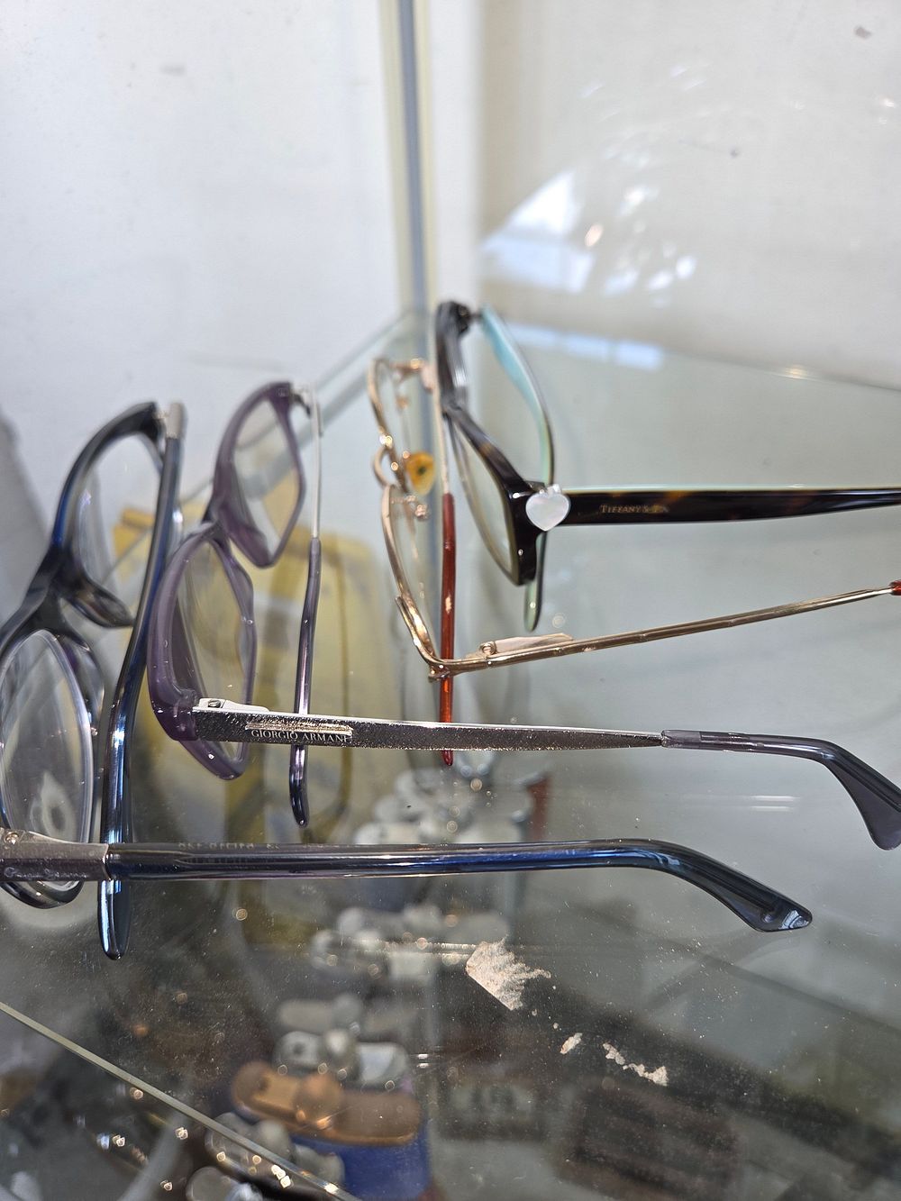 Lot 605 – A Group of Designer and Fashion Spectacle Frames including Tiffany and Co, Giorgio Armani, and Police
