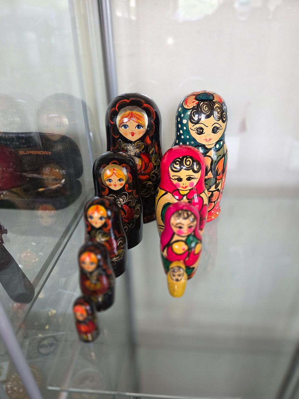 Lot 610 – A Collection of Russian Hand-Painted Wooden Matryoshka Nesting Dolls