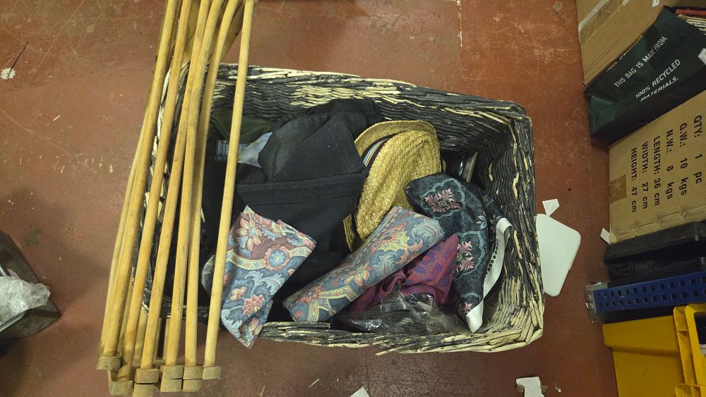 Lot 167 – A Wooden Folding Frame Airer and a Rectangular Wicker Basket Containing an Assortment of Clothing