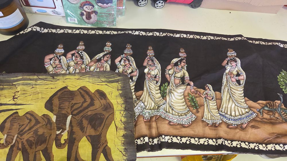 Lot 214 – Two Decorative Textile Wall Hangings comprising an Indian Sequined Folk Art Panel and an African Elephant Batik