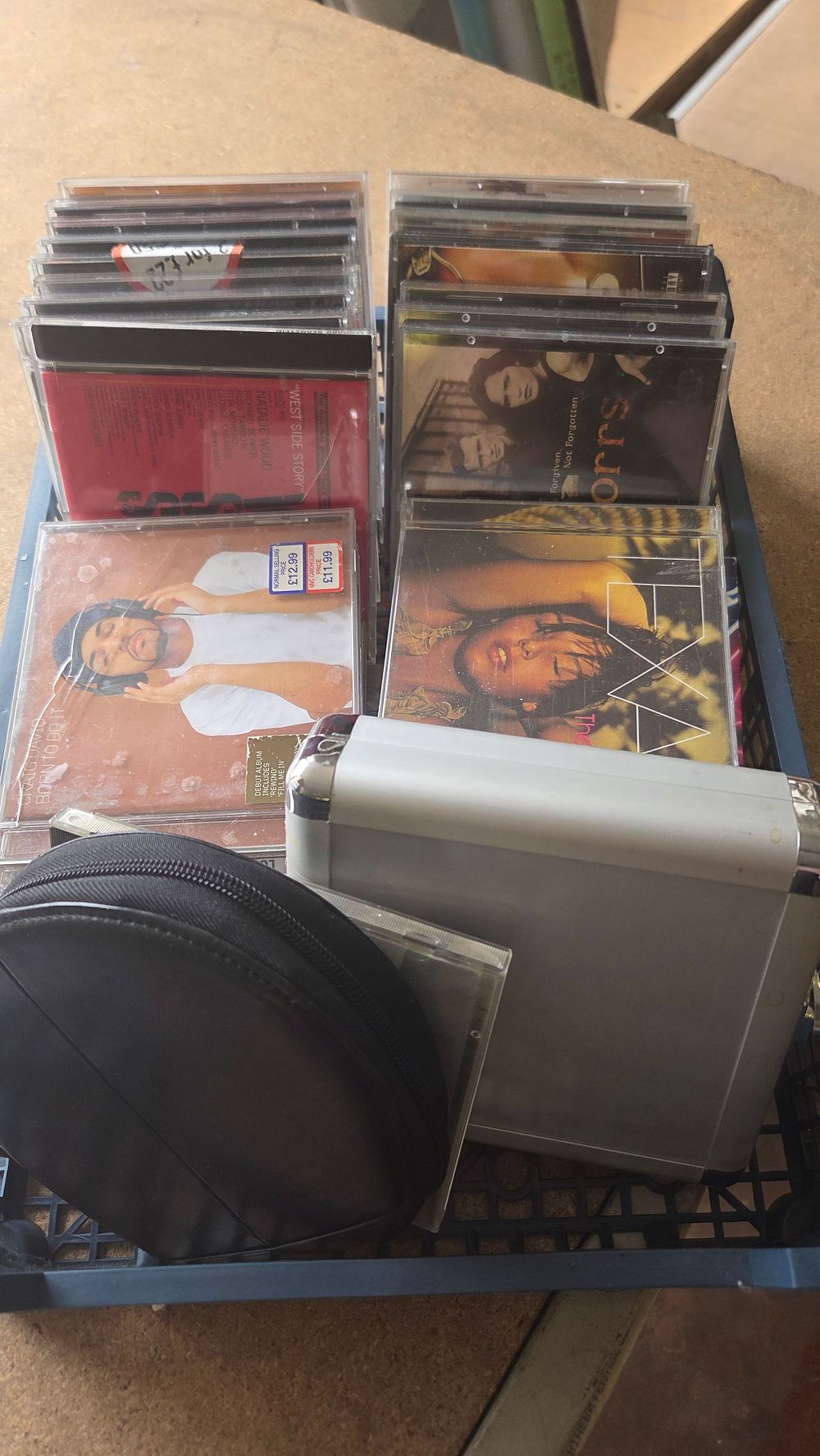 Lot 188 – An Assortment of Music Compact Discs and Portable Storage Cases