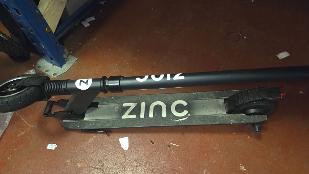 Lot 235 – Zinc Folding Electric Scooter