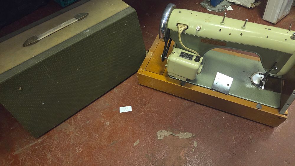 Lot 244 – A Mid-20th-Century Cosson Electric Sewing Machine with Case