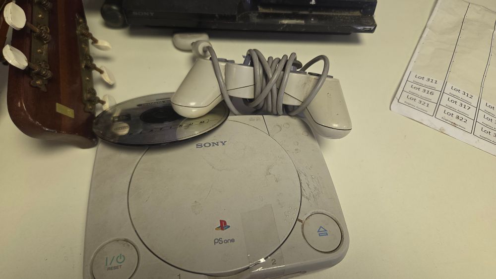 Lot 310 – Sony Play Station One, with Controller