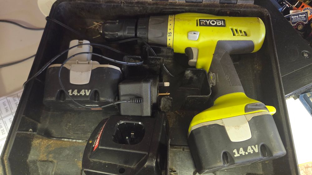 Lot 335 – A Ryobi 14.4V Cordless Drill and Driver Set with Accessories