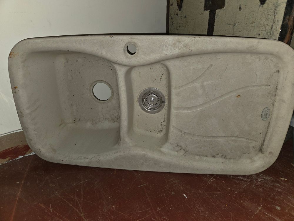 Lot 394 – A Carron Phoenix one-and-a-half bowl composite kitchen sink with draining board