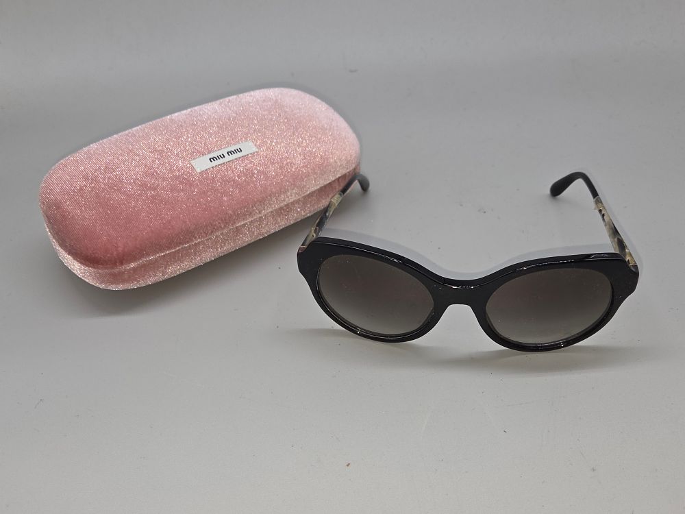 Lot 640 – Miu Miu Black and Patterned Acetate Ladies Sunglasses with Original Pink Glitter Case