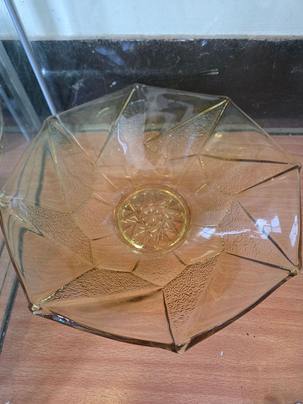 Lot 633 – An Art Deco Amber Pressed Glass Octagonal Bowl Attributed to Sowerby