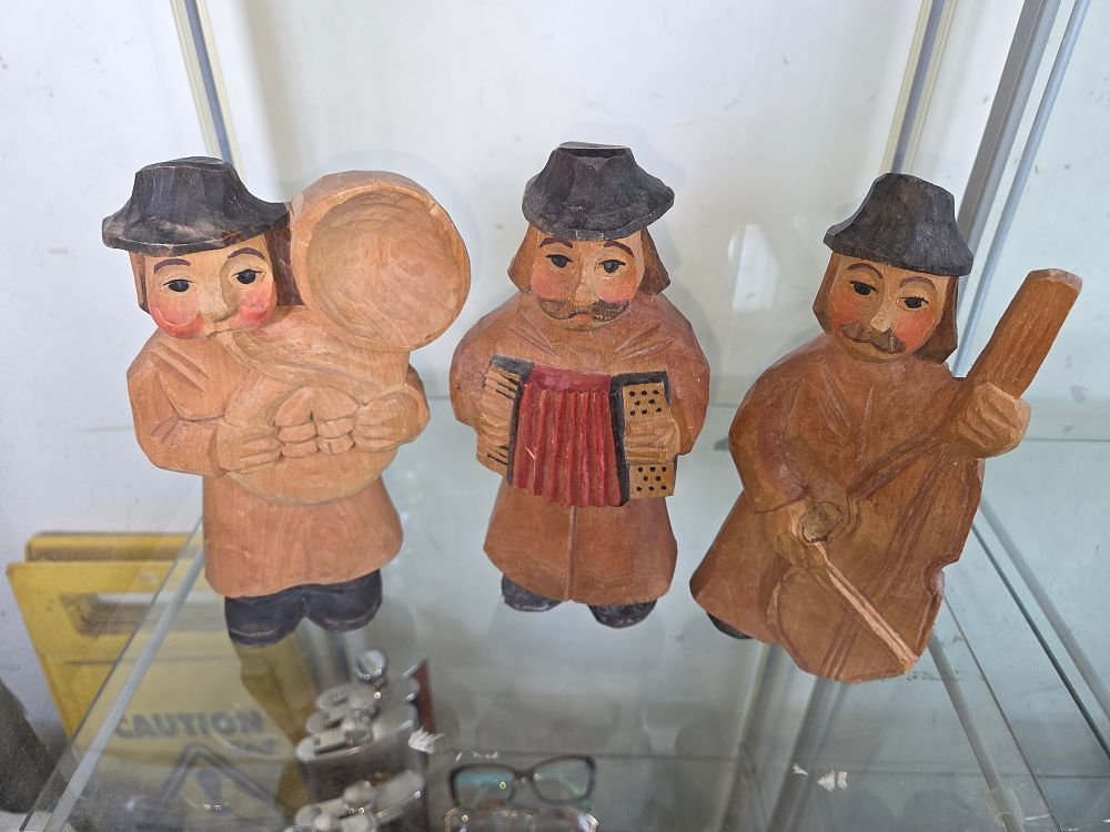 Lot 645 – A Trio of Continental European Hand-Carved Wooden Folk Musician Figurines