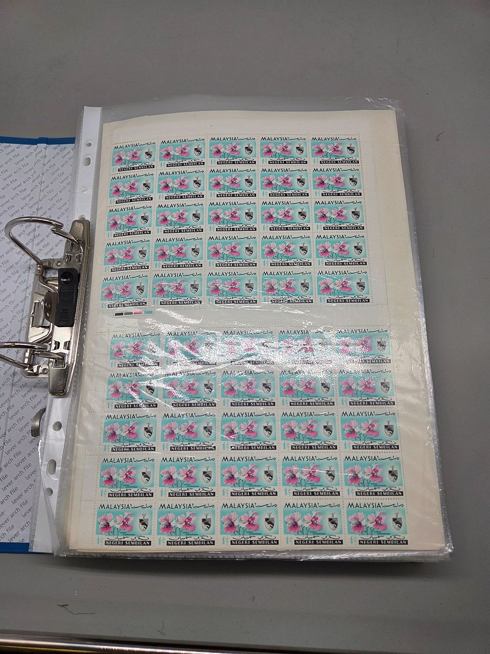 Lot 264 – A Collection of Worldwide Stamps, 19th-20th Century, including MY, CA, AU, DE, and IN