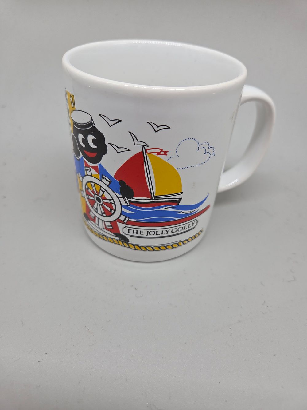 Lot 280 – A Kilncraft Jolly Golly Sailor Character Mug