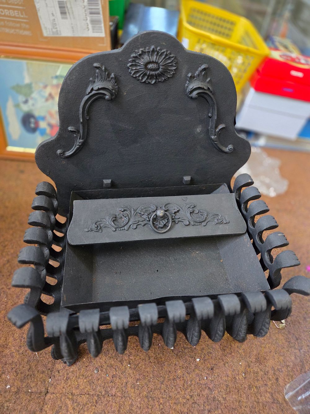 Lot 285 – A Victorian Style Cast Iron Fire Basket with Sunburst Backplate